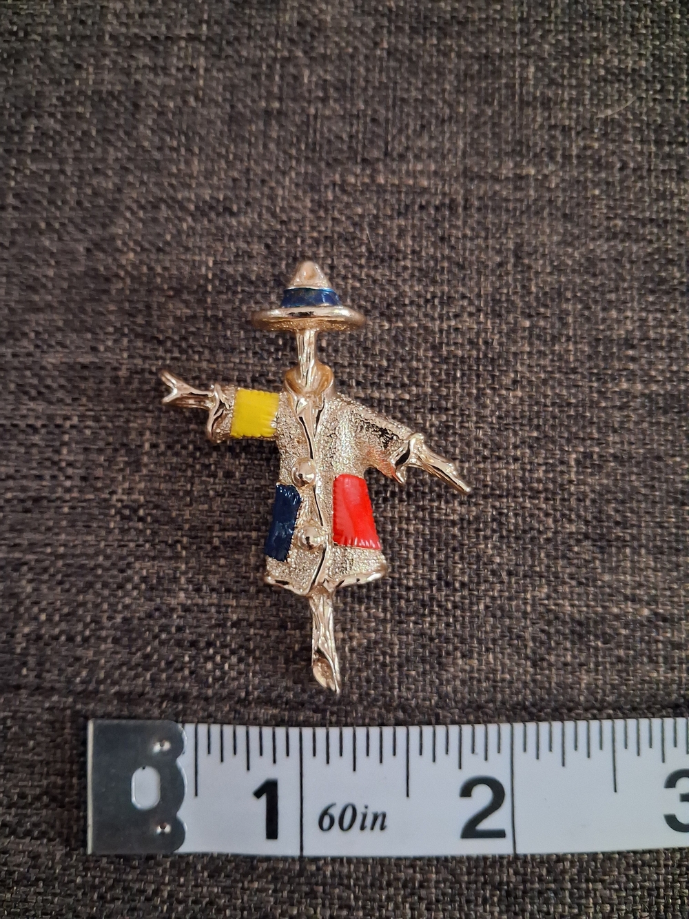 Sarah Coventry Gold-Tone Scarecrow Brooch with Yellow, Blue & Red Accents
